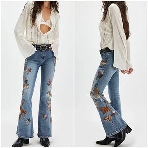 Free People Blue Flare with Safari theme embroidery.